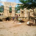 Cement bags being wheeled to site.jpg